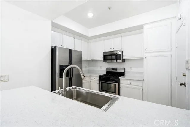 Kitchen with stainless-steel appliances at 1473 Holcomb Pl